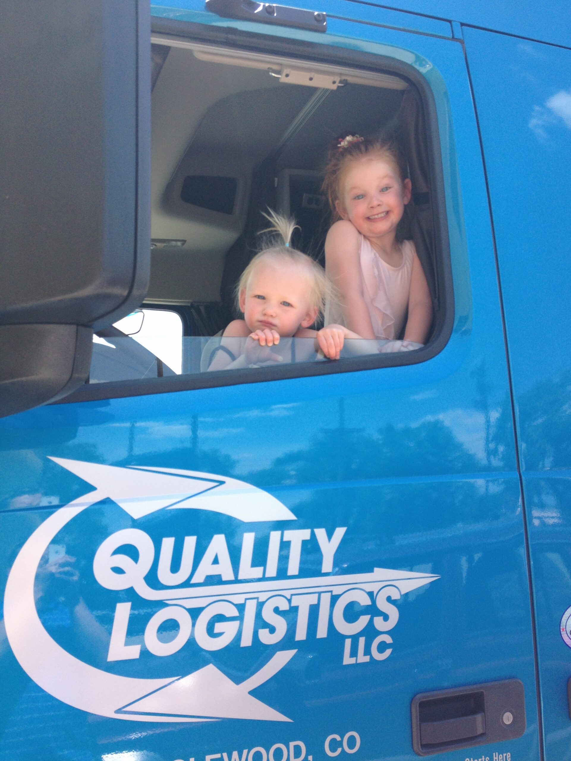 Kids in Quality Logistics Truck
